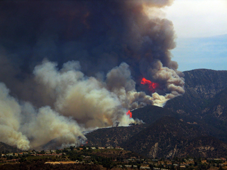 Calif. firefighters wage fierce wildfire battles