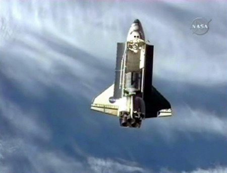 Shuttle Discovery arrives at space station