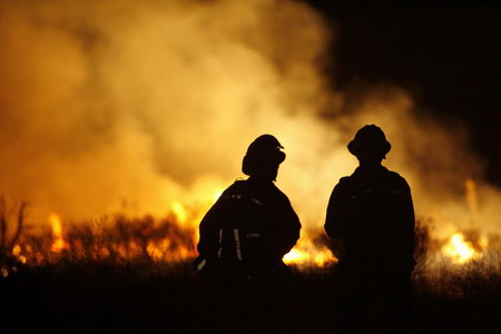 LA wildfire threatens 12,000 homes; 2 dead