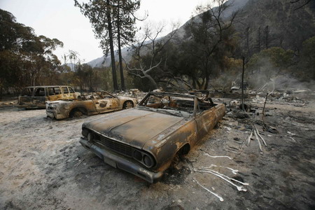 Calif. residents return to survey fire damage