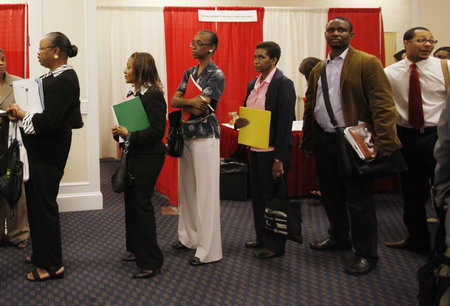US new jobless claims drop slightly