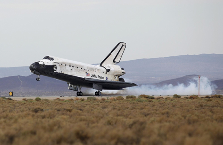 Shuttle Discovery back home safely after 14-day mission