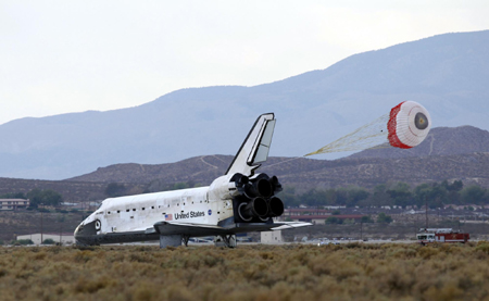 Shuttle Discovery back home safely after 14-day mission
