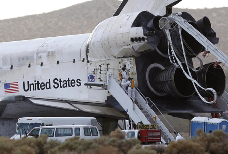 Shuttle Discovery back home safely after 14-day mission