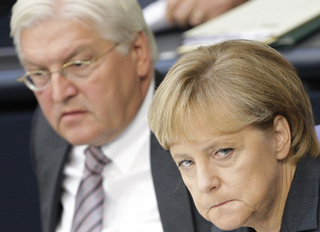 Merkel, Steinmeier stage passionless TV debate ahead of election
