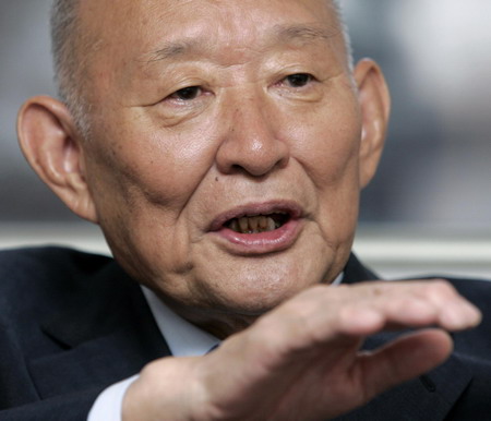 Former finance minister <b>Hirohisa Fujii</b> speaks to Reuters reporters during an <b>...</b> - 0022190fd3300c193d6d2d