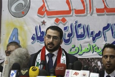 Freed shoe-thrower says he was tortured