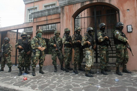 Honduran forces clash with protesters at embassy