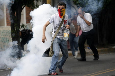 Honduran forces clash with protesters at embassy