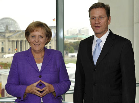 German minister-to-be rebuffs question in English