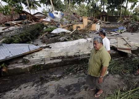 Aid flows to tsunami-hit Samoas as deaths hit 119