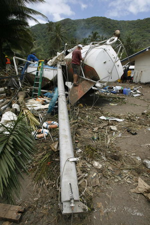 Aid flows to tsunami-hit Samoas as deaths hit 119