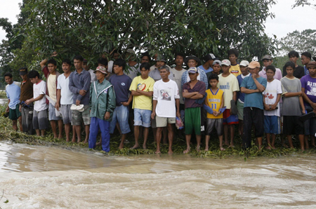 Rain, floods in N. Philippines kill over 100