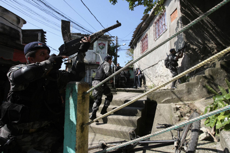 Brazil vows safe Olympics after 14 killed