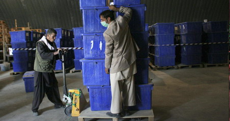 Election officials deliver Afghan runoff ballots