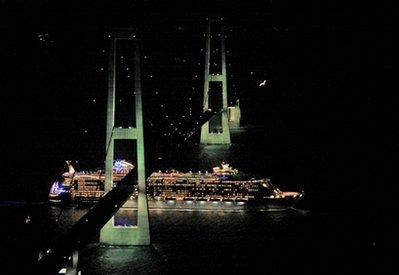 Largest cruise ship squeezes under Danish bridge