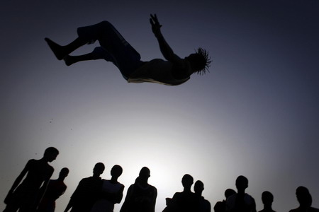 Acrobatic flips performed in Dakar
