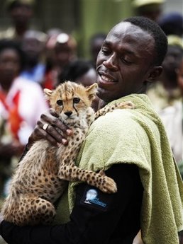 World's fastest man adopts world fastest feline