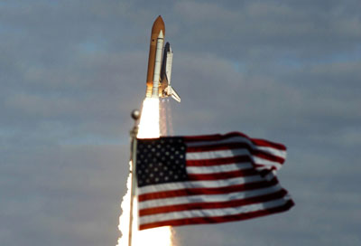 Space shuttle Atlantis lifts off on supply mission