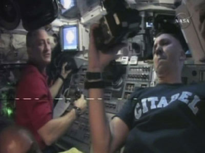 Astronaut in space while wife giving birth
