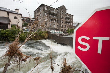 Residents tidy homes up as flood fades away in UK