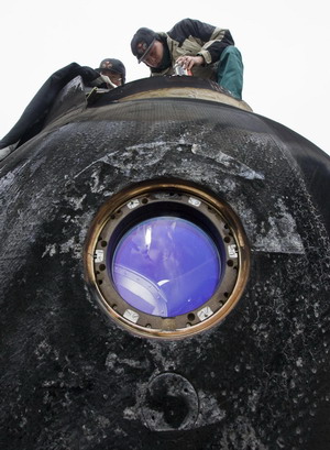 Space station crew land safely in Kazakhstan