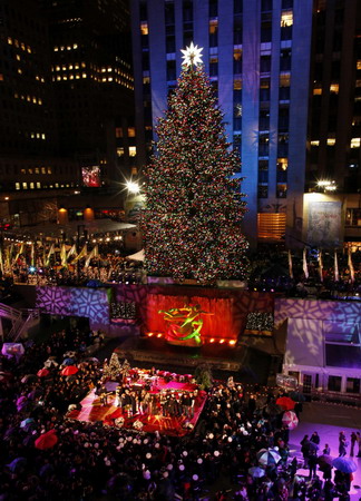 Rockefeller Center Christmas Tree lighting up