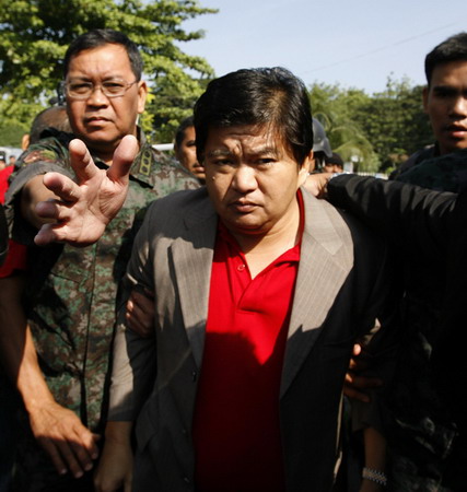 Philippines imposes martial law in massacre province