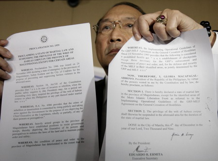 Philippines imposes martial law in massacre province