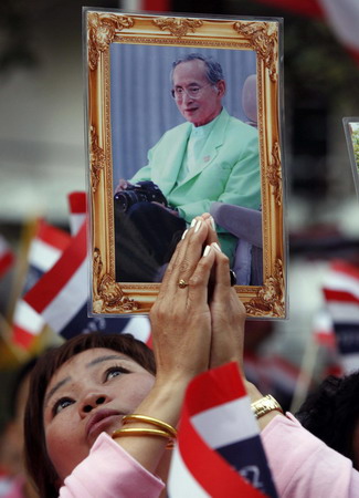 Ailing Thai king calls for peace on 82nd birthday