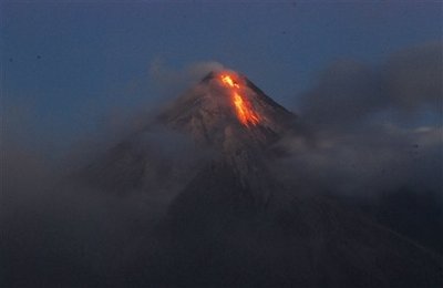 20,000 evacuated as Philippine volcano oozes lava