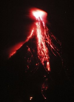 20,000 evacuated as Philippine volcano oozes lava