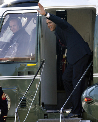 Obamas arrive in Hawaii for vacation