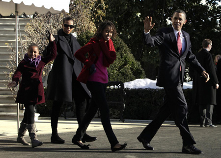 Obamas arrive in Hawaii for vacation