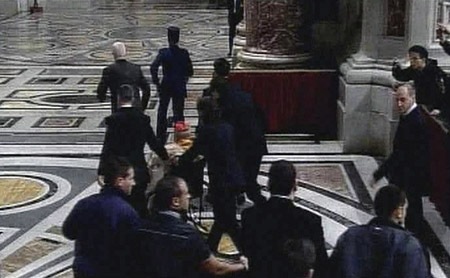Woman knocks pope to floor in Basilica