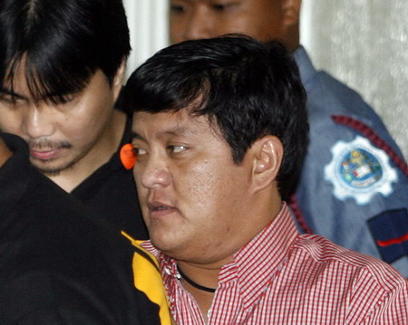 Suspect in Philippine massacre pleads not guilty