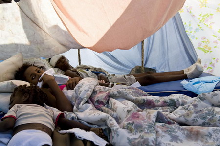 Haitians fill triage center, but little treatment