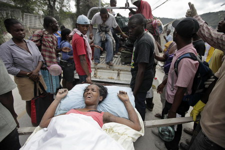 Haitians fill triage center, but little treatment