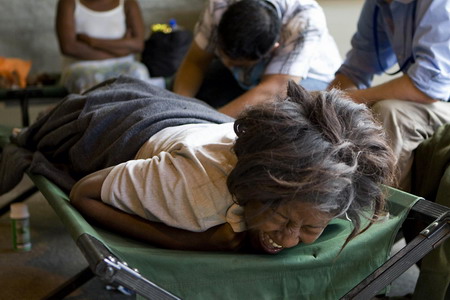 Haitians fill triage center, but little treatment