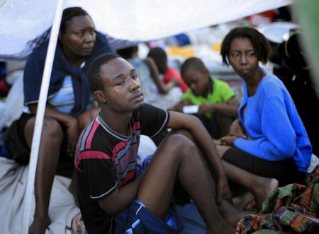 Haitians fill triage center, but little treatment