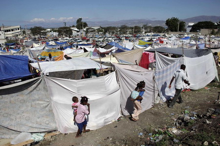 Haitians fill triage center, but little treatment