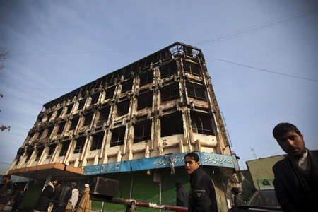 Afghans tighten security in Kabul after attack