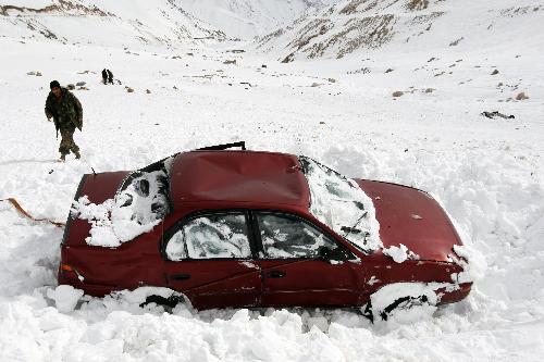 Afghans airlift bodies as avalanche deaths hit 166