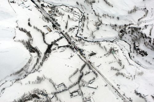 Afghans airlift bodies as avalanche deaths hit 166