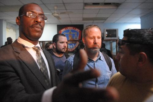 Eight freed Americans leave for home