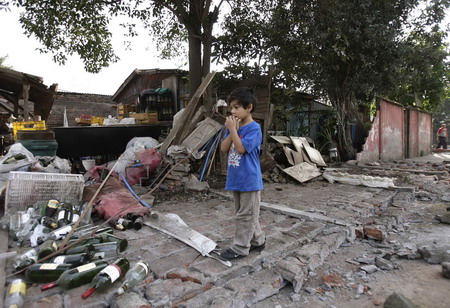 Chile assesses damage from mammoth earthquake