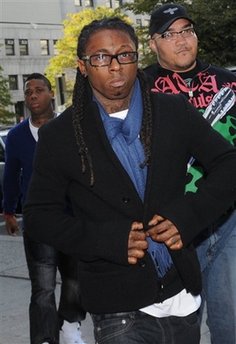 Lil Wayne sentencing postponed due to court fire