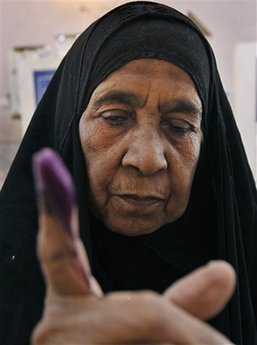 25 die as Iraqis defy violence to vote in election