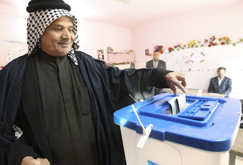 Iraqi police: Mortars kill 3 as nation votes