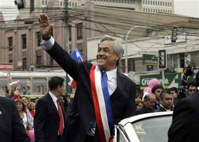 Strong quakes torment Chile as president sworn in